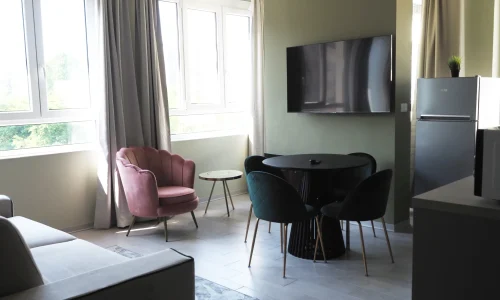 cozy-seating-area-with-natural-light-mont-blanc-suite-torino-loft